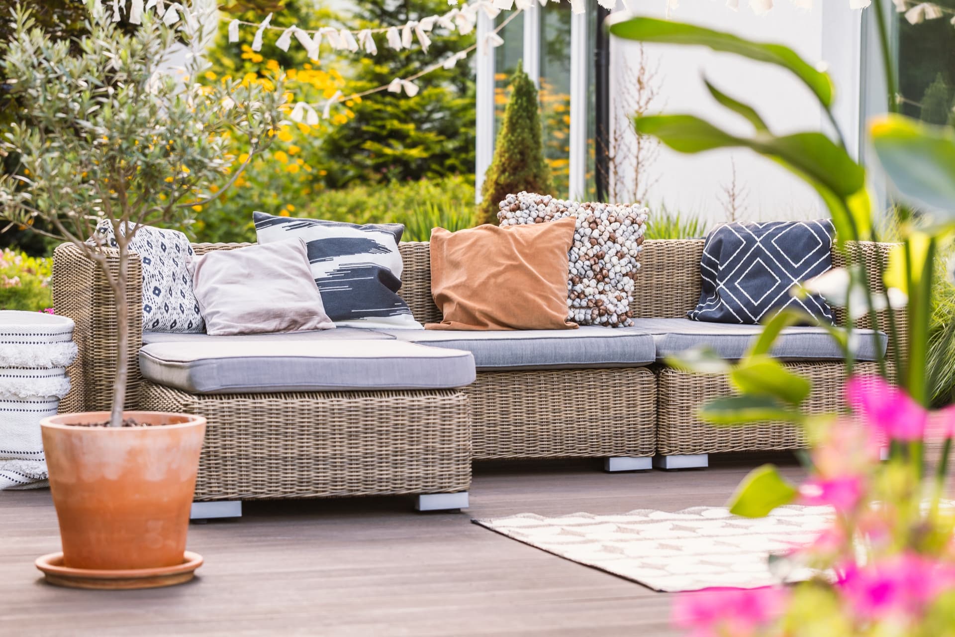 Custom paver patio with outdoor seating in a Massachusetts backyard