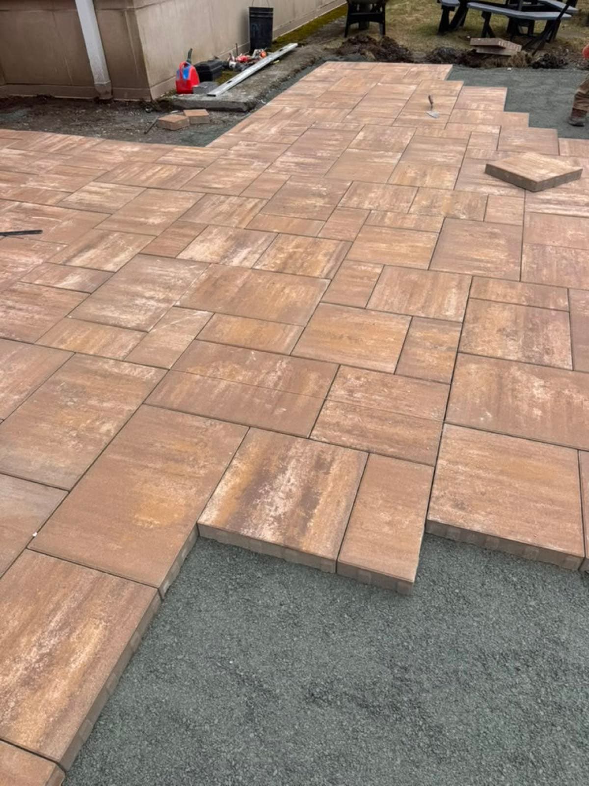 Freshly sealed paver patio with tight joint sand at a home on the South Shore of Massachusetts